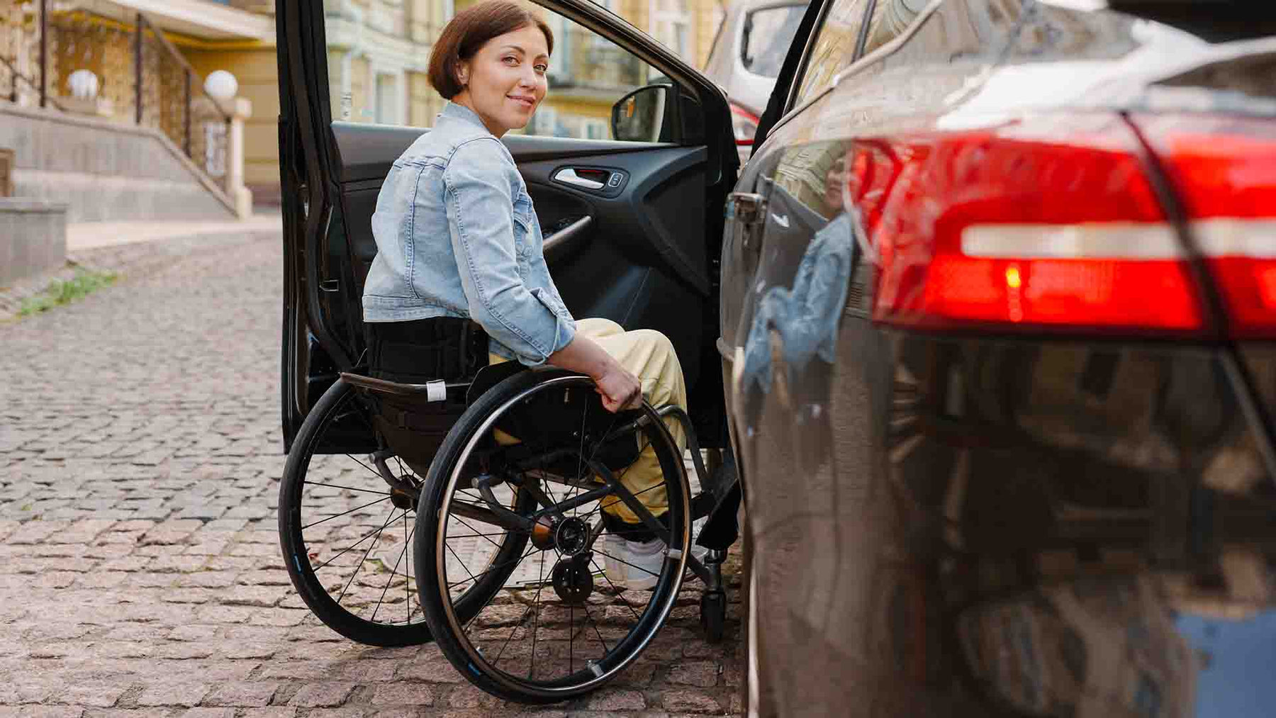 Sedie a rotelle autospinta e transito